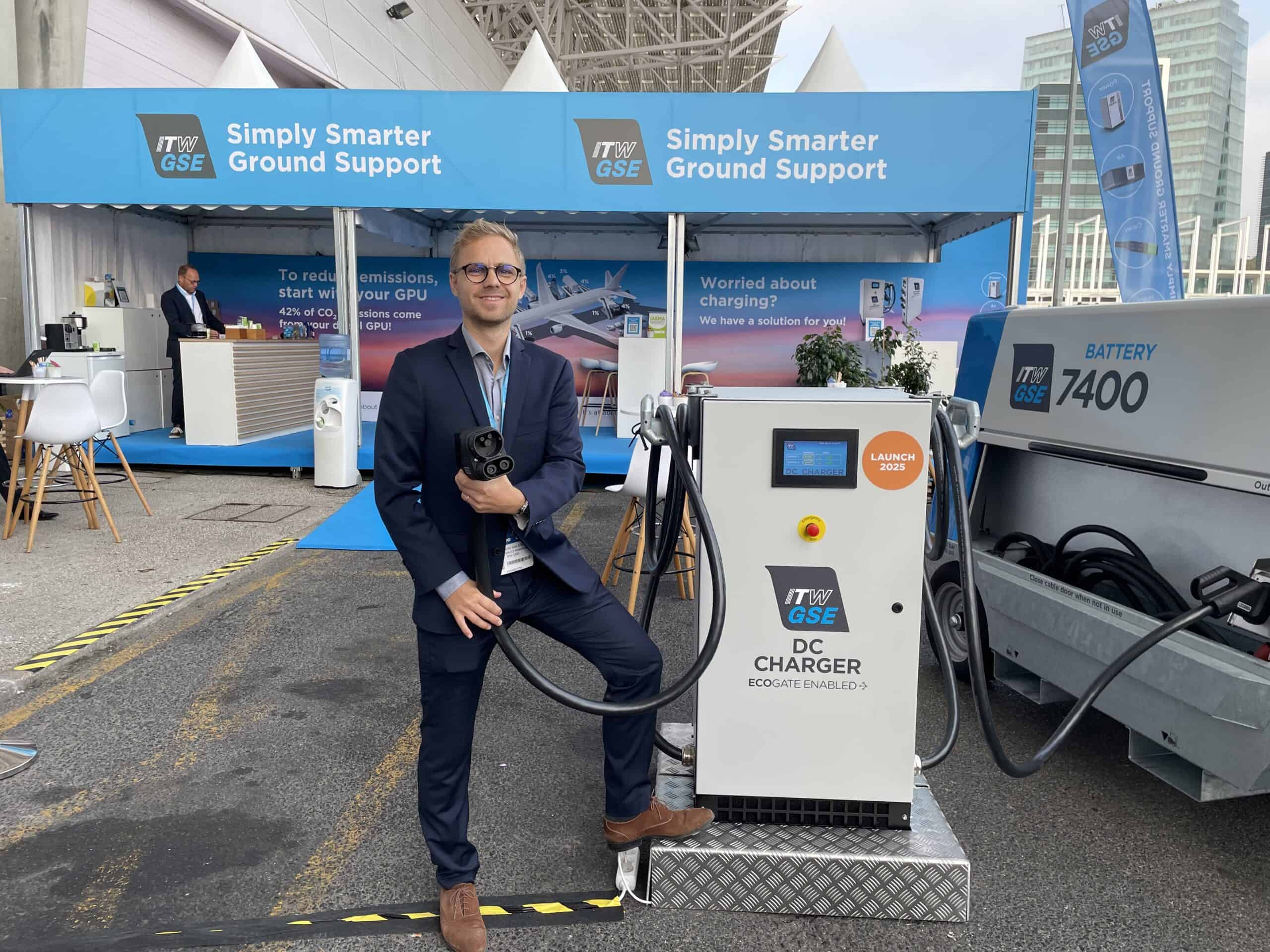 Martin Walsted with the DC Charger at an exhibition